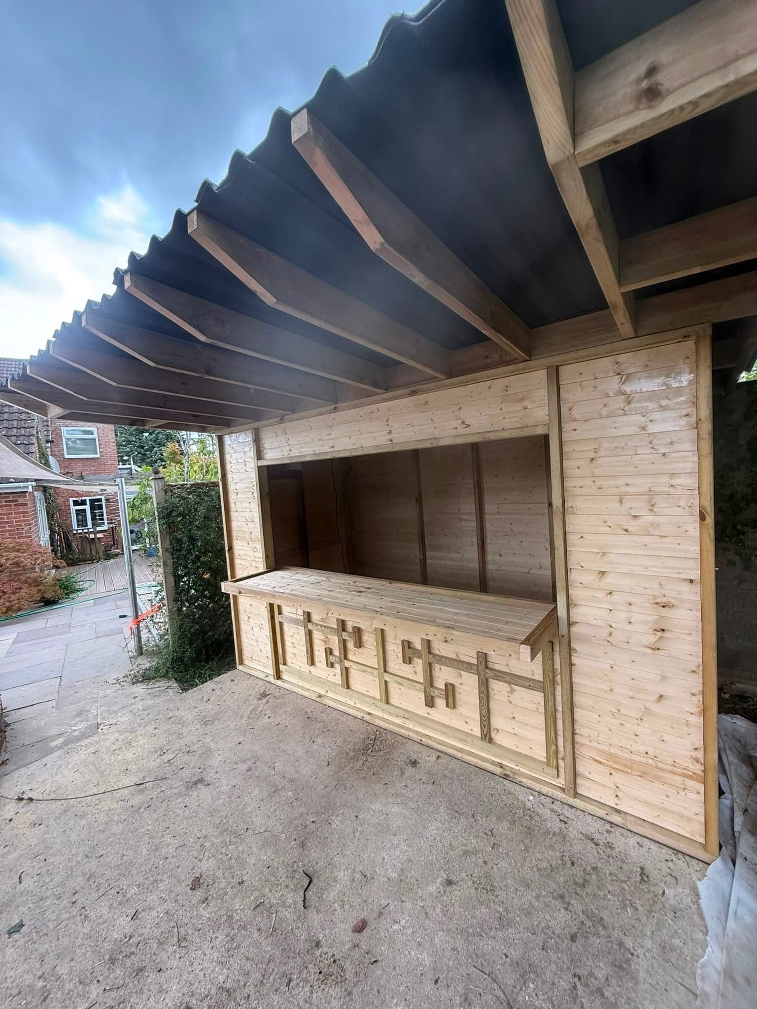 Timber garden bar with hatch and slatted front